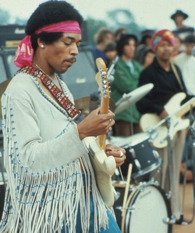 Hendrix wearing strap Woodstock